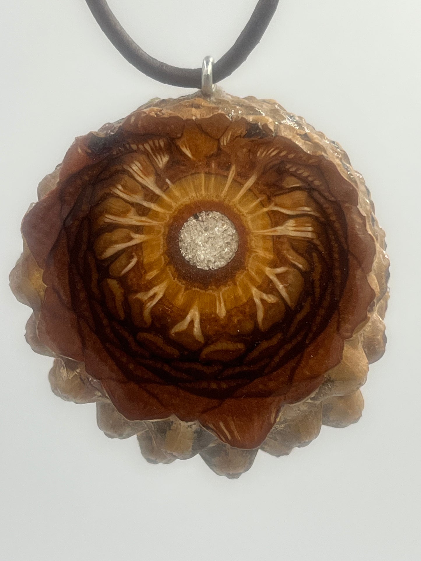 Knobcone pinecone pendant with silver leaf inlay